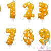 Candeline numero a pois giallo